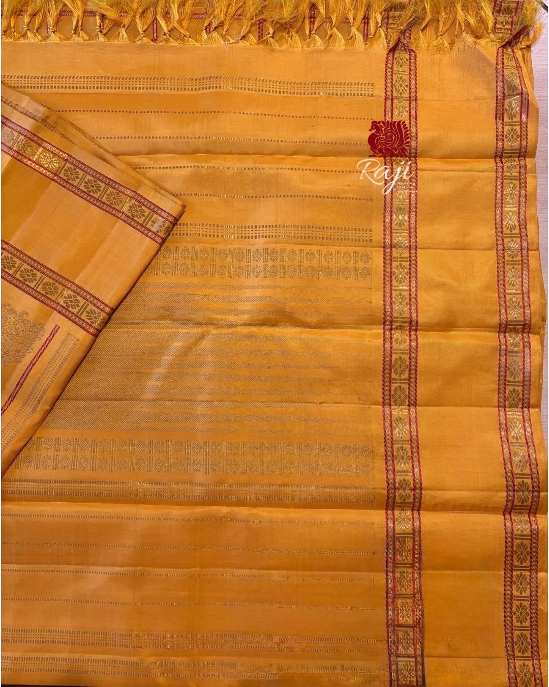 Golden Mustard Veldhari kattam monotone Kanjivaram Silk Saree with Meenakari buttas - RK0750